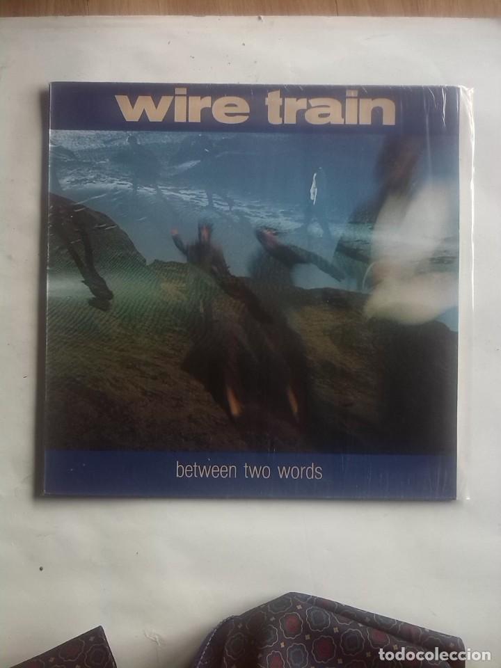 Discos de vinilo: WIRE TRAIN BETWEEN TWO WORLDS - Foto 1