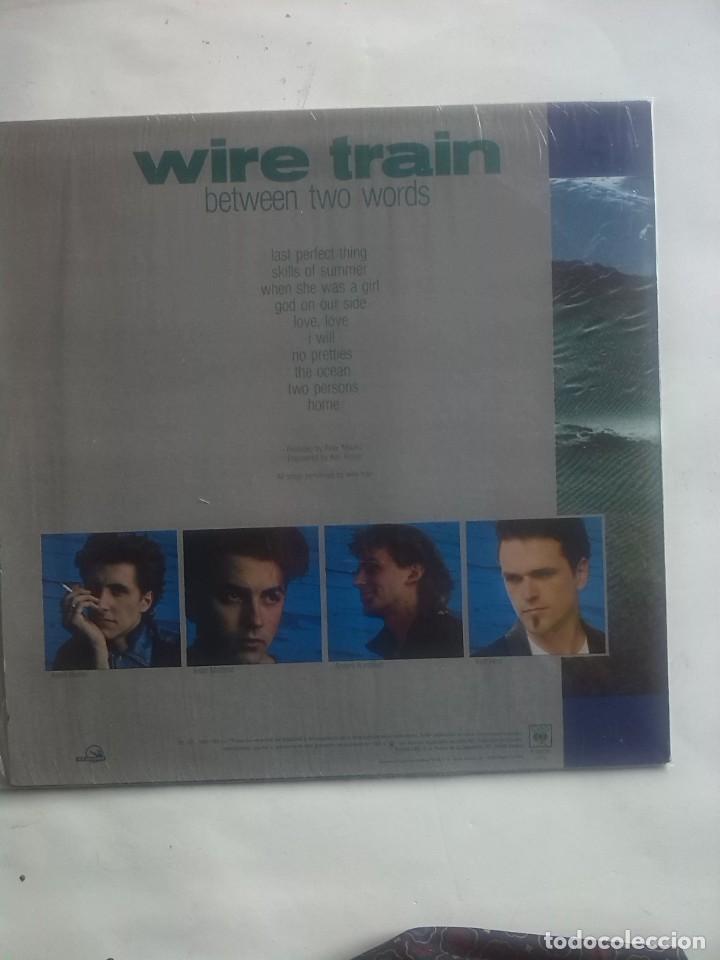 Discos de vinilo: WIRE TRAIN BETWEEN TWO WORLDS - Foto 2