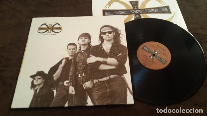 Discos de vinilo: HEROES DEL SILENCIO LP. SENDEROS DE TRAICION. MADE IN SPAIN. 1990. - Foto 1