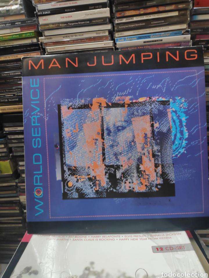 Discos de vinilo: Man jumping world service - Foto 1