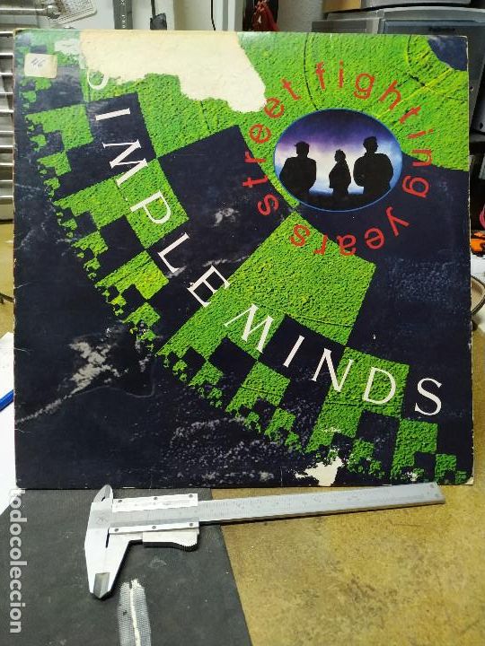 Discos de vinilo: SIMPLE MINDS STREET FIGHTING YEARS - Foto 1