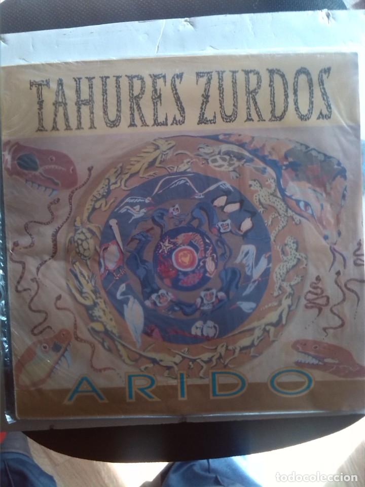 Discos de vinilo: TAHURES ZURDOS - ARIDO - Foto 1