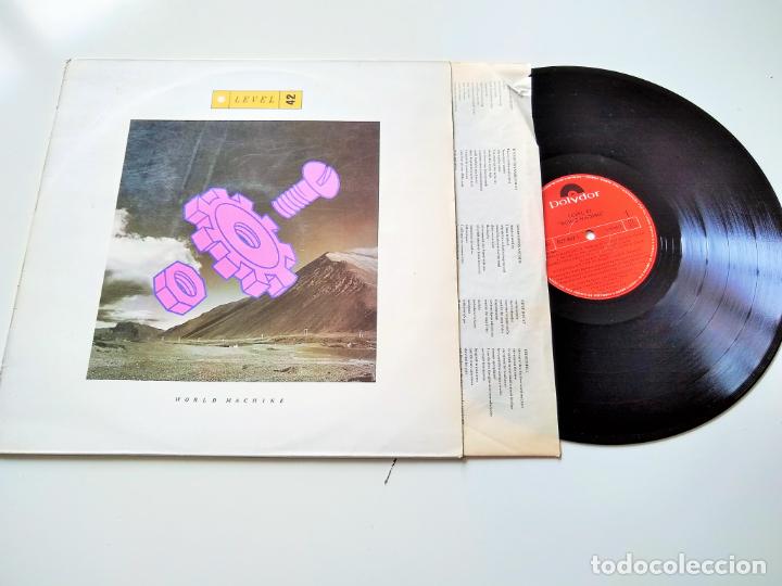 Discos de vinilo: LEVEL 42. WORLD MACHINE. LP. ENCARTE - Foto 1