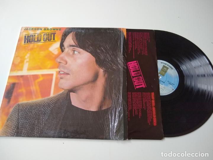 Discos de vinilo: JACKSON BROWNE. HOLD OUT. ENCARTE. LP - Foto 1