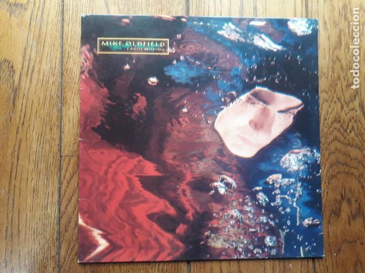 Discos de vinilo: Mike oldfield - earth moving - Foto 1