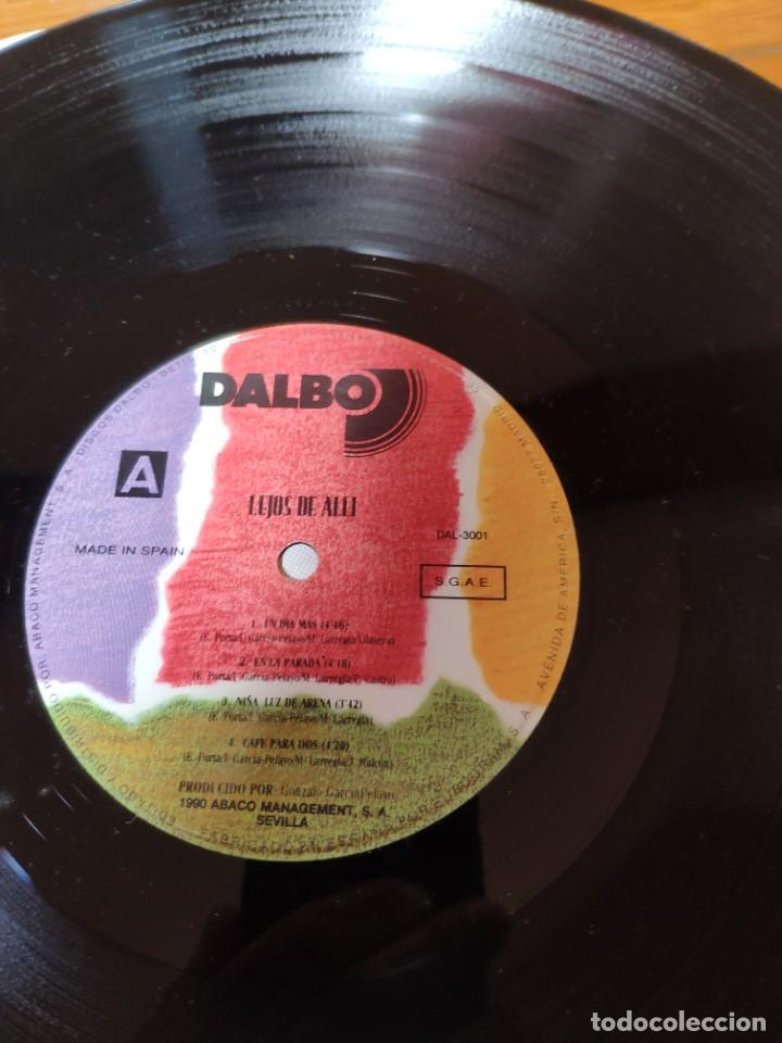 Discos de vinilo: LP de vinilo del grupo lejos de all&iacute; - Foto 3