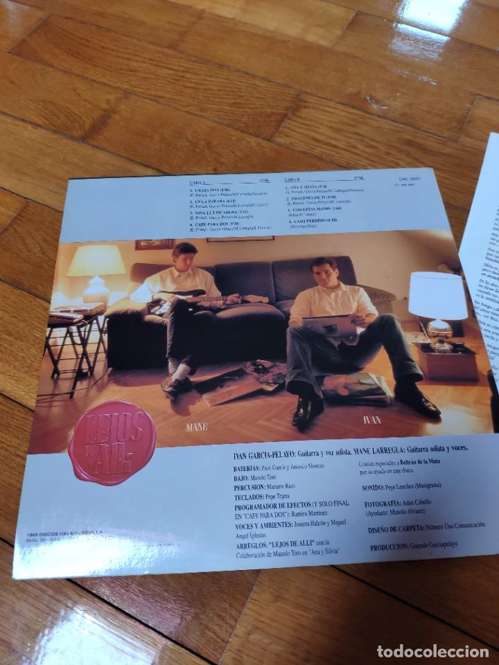 Discos de vinilo: LP de vinilo del grupo lejos de all&iacute; - Foto 4
