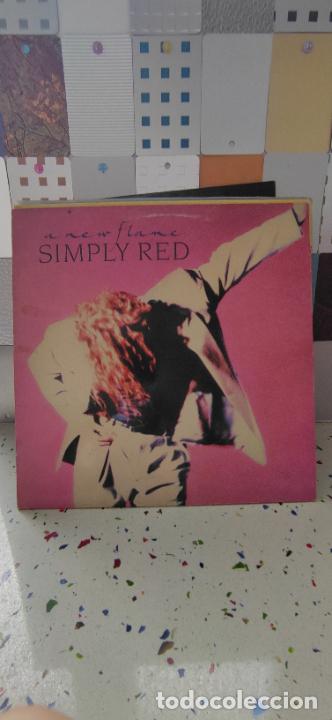 Discos de vinilo: LP simply Red A new flame - Foto 1