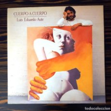 Discos de vinilo: LUIS EDUARDO AUTE, LP CUERPO A CUERPO + PÓSTER DIBUJO, ARIOLA I-206137, 1984. Lote 233457100