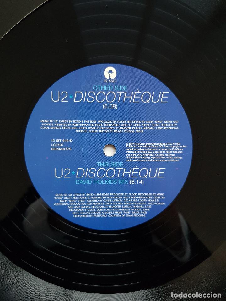 Discos de vinilo: U2. Discoth&egrave;que. Triple maxisingle. Island. 1997 - Foto 4