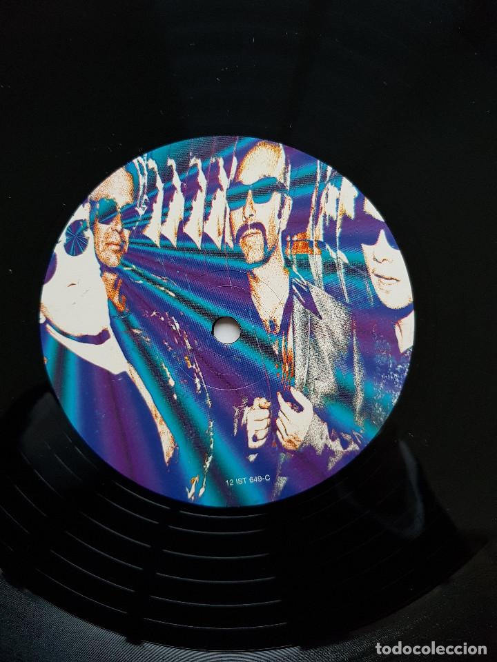 Discos de vinilo: U2. Discoth&egrave;que. Triple maxisingle. Island. 1997 - Foto 5