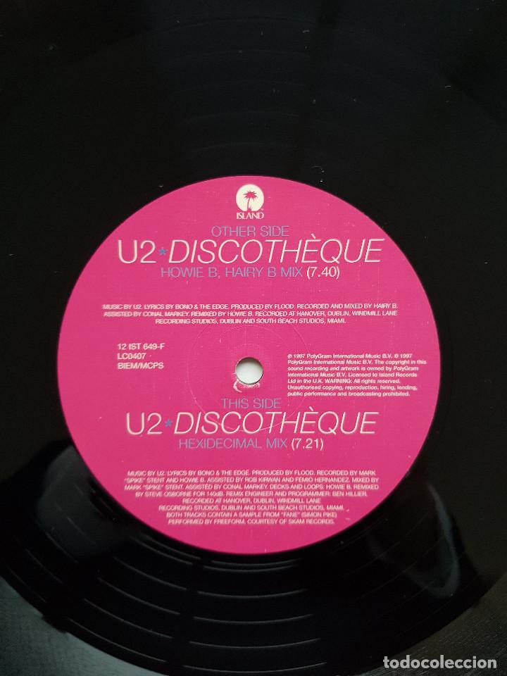 Discos de vinilo: U2. Discoth&egrave;que. Triple maxisingle. Island. 1997 - Foto 9