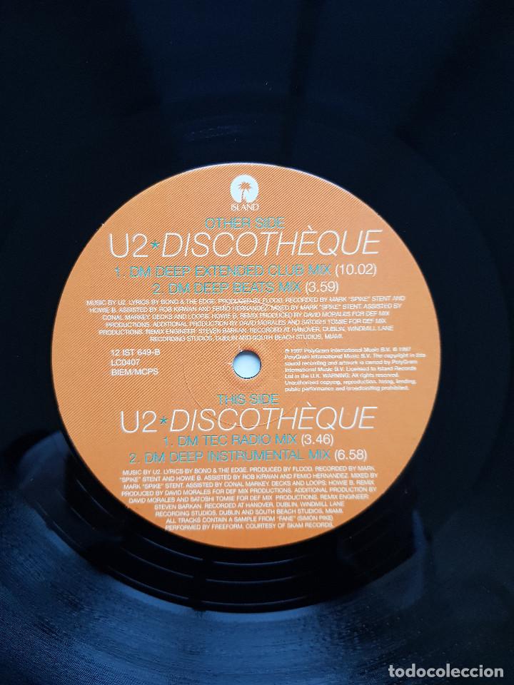 Discos de vinilo: U2. Discoth&egrave;que. Triple maxisingle. Island. 1997 - Foto 12
