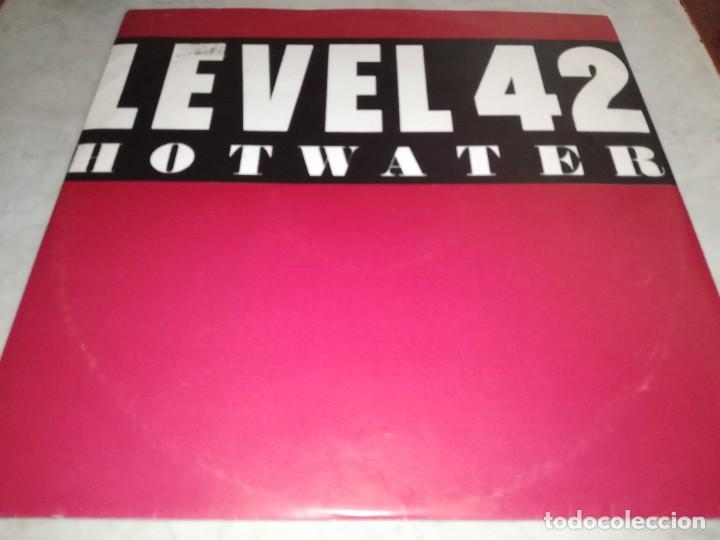 Discos de vinilo: LEVEL 42-HOT WATER - Foto 1
