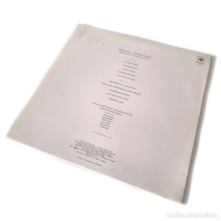 Discos de vinilo: Paul Young - Between Two Fires - Foto 2