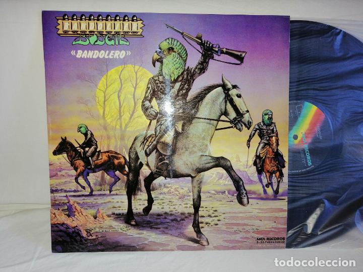 Discos de vinilo: budgie.- bandolier lp. spain 1975 nuevo a estrenar. ver mas informacion