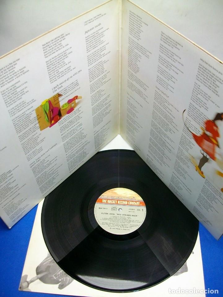Discos de vinilo: ELTON JOHN REG STRIKES BACK LP - Foto 4