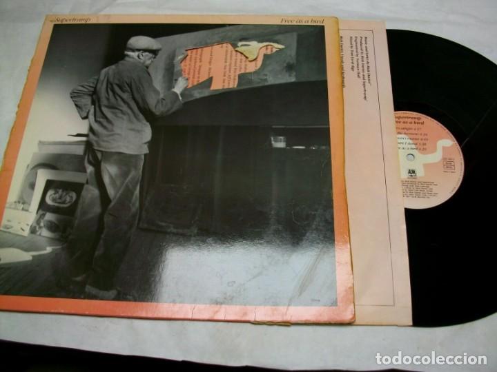 Discos de vinilo: SUPERTRAMP FREE AS A BIRD LP - Foto 1