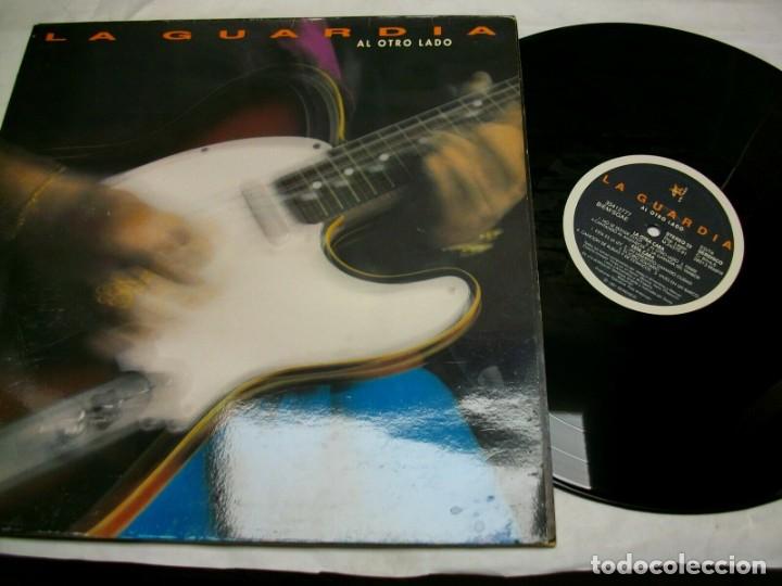 Discos de vinilo: LA GUARDIA AL OTRO LADO VINYL GATEFOLD LP - Foto 1