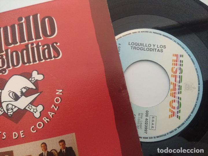 Discos de vinilo: SINGLE/LOQUILLO Y LOS TROGLODITAS/A GOLPES DE CORAZON. - Foto 2