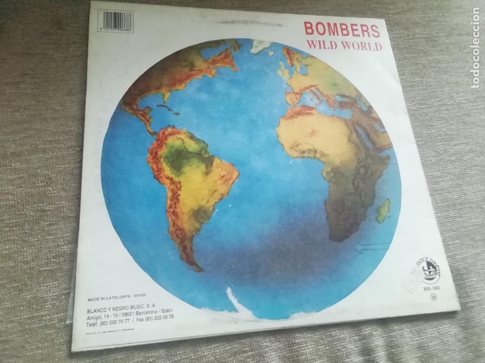 Discos de vinilo: Bombers-wild world. maxi espa&ntilde;a - Foto 2