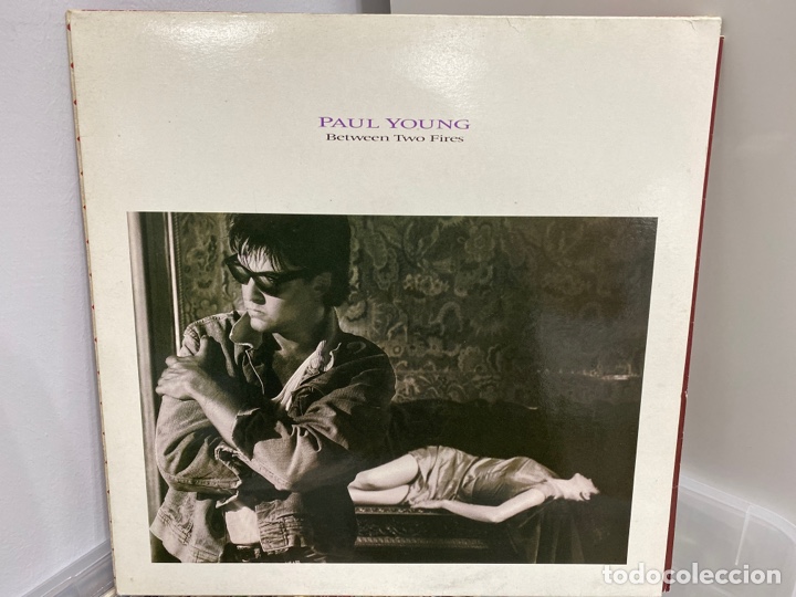 Discos de vinilo: Paul Young - Between Two Fires (LP, Album) - Foto 1