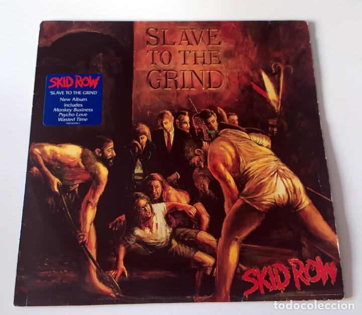 Discos de vinilo: LP SKID ROW - SLAVE TO THE GRIND - Foto 1
