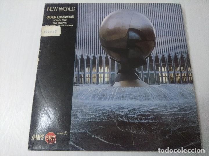 Discos de vinilo: NEW WORLD/DIDIER LOCKWOOD/VINILO. - Foto 1