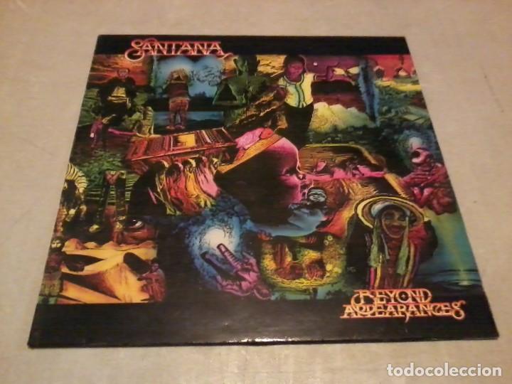 Discos de vinilo: Santana LP Beyond Appariences Esp.1985 encarte letras insert - Foto 1