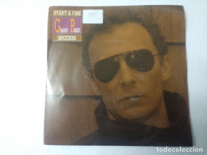 Discos de vinilo: GRAHAM PARKER/START A FIRE/SINGLE. - Foto 1
