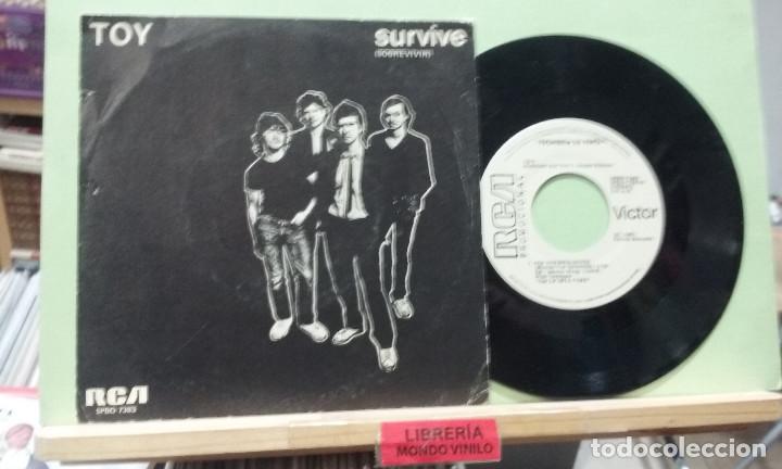 Discos de vinilo: Toy. Survive / Pin striped suits. RCA 1981 -- Single - Foto 1