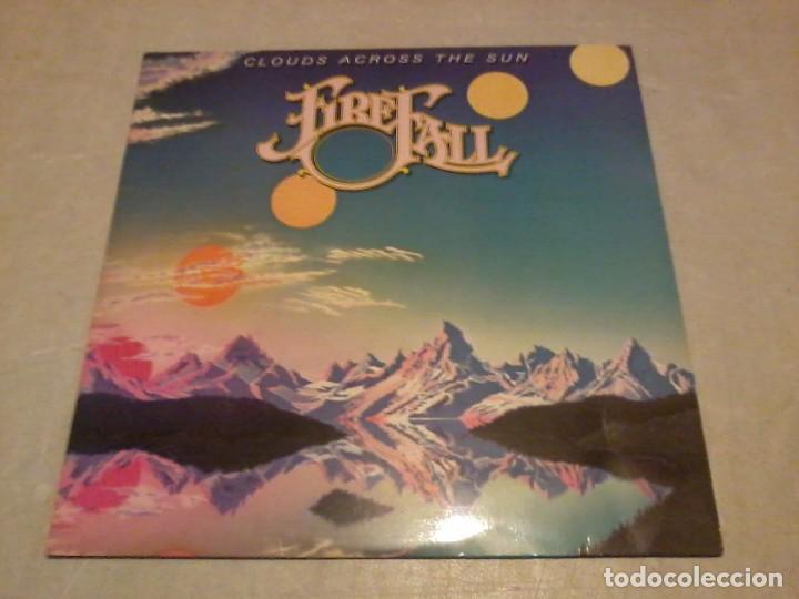 Discos de vinilo: Firefall LP Clouds Across the Sun Esp.1981 encarte letras - Foto 1