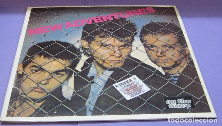 Discos de vinilo: New Adventures - LP - Foto 1