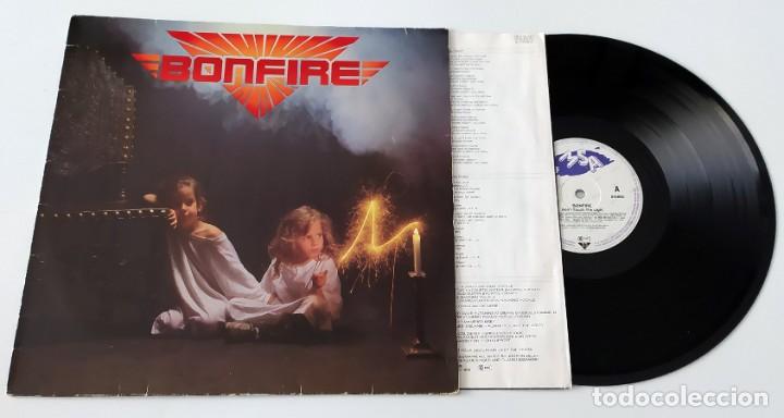 Discos de vinilo: LP BONFIRE - DON&acute;T TOUCH THE LIGHT - Foto 3