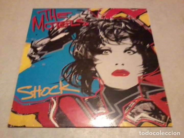 Discos de vinilo: Motels Lp Shock Esp.1985 insert letras - Foto 1
