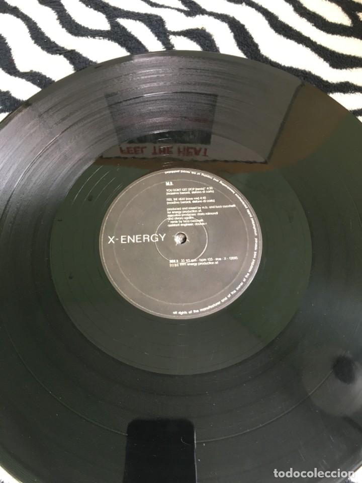 Discos de vinilo: M.B. &lrm;&ndash; Feel The Heat - Foto 3
