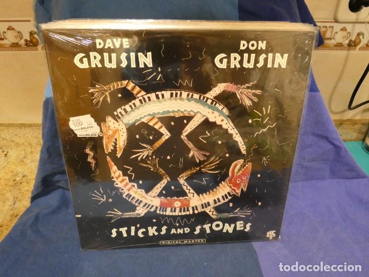Vinyl records: PACC167 lp DAVE AND DON GRUSIN STICKS AND STONES 1988 MUY BUEN ESTADO GENERAL