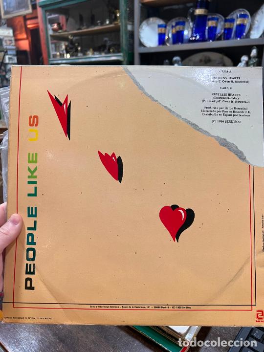 Discos de vinilo: LP PEOPLE LIKE US - Foto 2