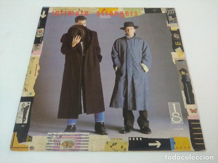Discos de vinilo: INTIMATE STRANGERS/VINILO. - Foto 1