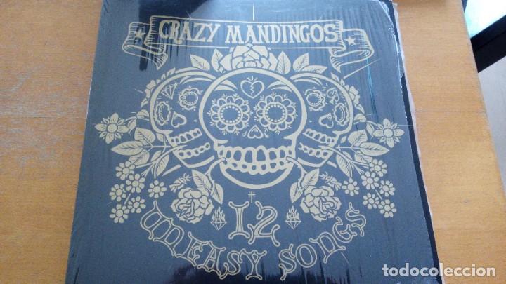 Discos de vinilo: CRAZY MANDINGOS Uneasy Songs LP CON INSERTOS - Foto 1