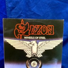 Discos de vinilo: DISCO LP SAXON WHEELS OF STEEL 31X31CMS. Lote 358904450