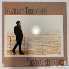 Discos de vinilo: LP LOQUILLO Y TROGLODITAS – MIENTRAS RESPIREMOS DE 1993 INCLUYE POSTER. Lote 366244696