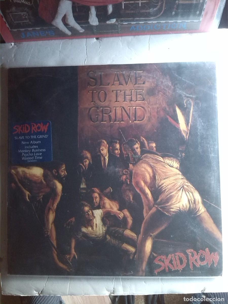 Discos de vinilo: skid row slave to the grind 1991 insert lp - Foto 1