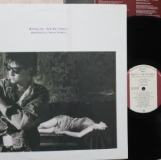 Discos de vinilo: PAUL YOUNG BETWEEN TWO FIRES LP VINYL MADE IN SPAIN 1986