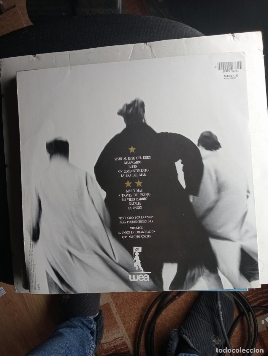 Discos de vinilo: La Union Vivir al este del eden 1988 insert lp - Foto 2