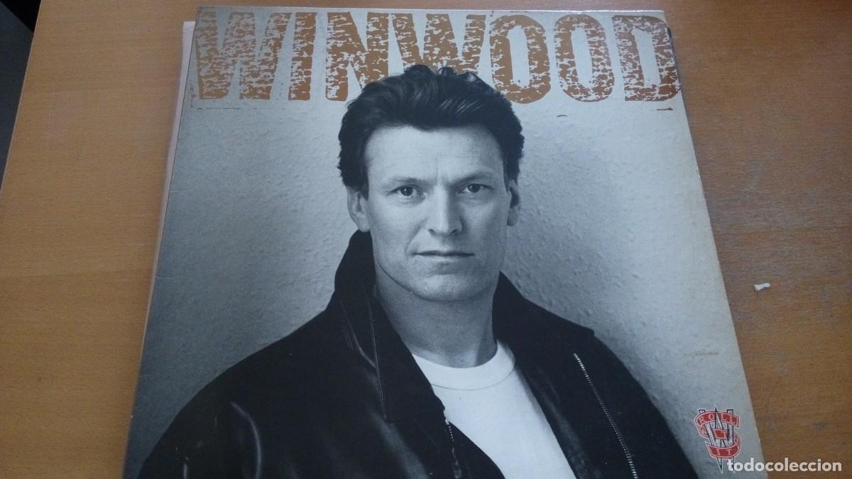 Discos de vinilo: STEVE WINWOOD ROLL WITH IT LP SPAIN - Foto 1