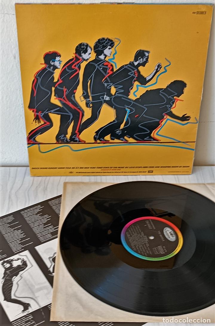 Discos de vinilo: THE MOTELS - SHOCK CAPITOL - 1985 - Foto 2