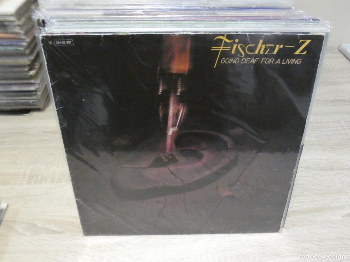 Disques de vinyle: ARKANSAS1980 PACC183 LP FISCHER Z GOING DEAF FOR A LIVING ALEMAN ALGUN NERVIO EN TAPA DISCOS OK