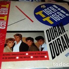 Discos de vinilo: DURAN DURAN TIGER TIGER EP VINILO MAXI JAPON COMPLETO 1984. Lote 401949914