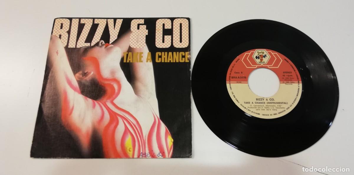 Disques de vinyle: S8- Bizzy & Co. - Take A Chance- 7&rdquo;, Single- PORT VG DISC NM